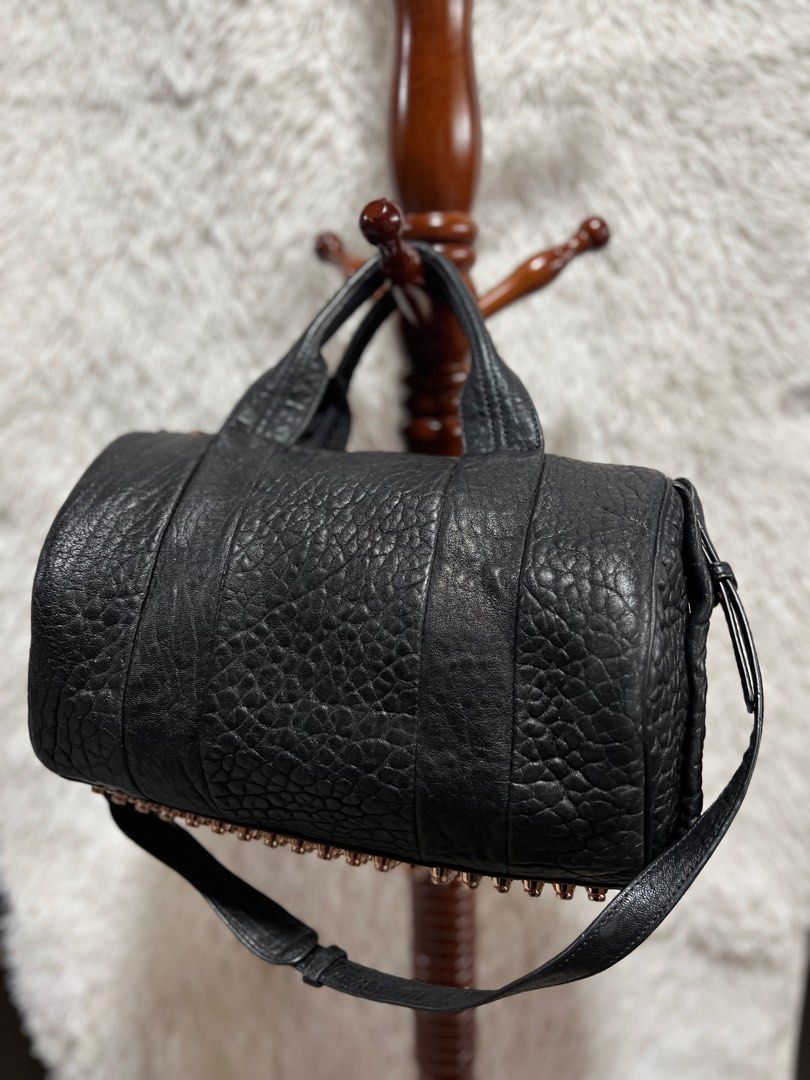 Alexander Wang Black Rocco (Category: Luxury Bags & Wallets) located in Baguio. Submitted by mischasboutique (Listing ID 1349017712, Image 1). Description: Genuine Leather Rose gold hardwares With sling Very minimal signs of use.