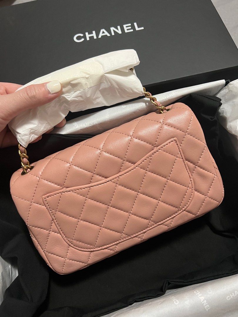 Authentic Chanel Pink Mini Rectangular Pearl Crush Flap Bag in Gold Hardware (Category: Luxury Bags & Wallets) located in Makati City. Submitted by cindiorella (Listing ID 1349115686, Image 3). Description: 100% guaranteed authentic Microchipped Comes with box, dust bag, booklet & entrupy In pristine condition 🥰 Adjustable Strap.