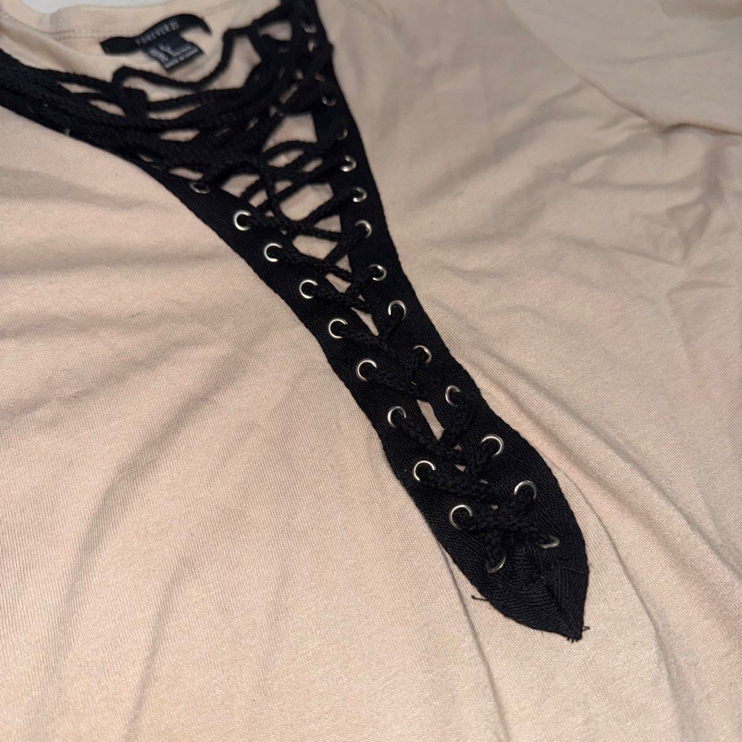 Forever 21 Oversize Tshirt Lace up MEDIUM- SEMI LARGE (Category: Others Tops) located in Manila. Submitted by eancc (Listing ID 1349111110, Image 3). Description: No damages, strings are intact, can fit medium to large frames ( US Small on tag but its oversized) RFS: Decluttering MOP: Gcash BDO BPI.