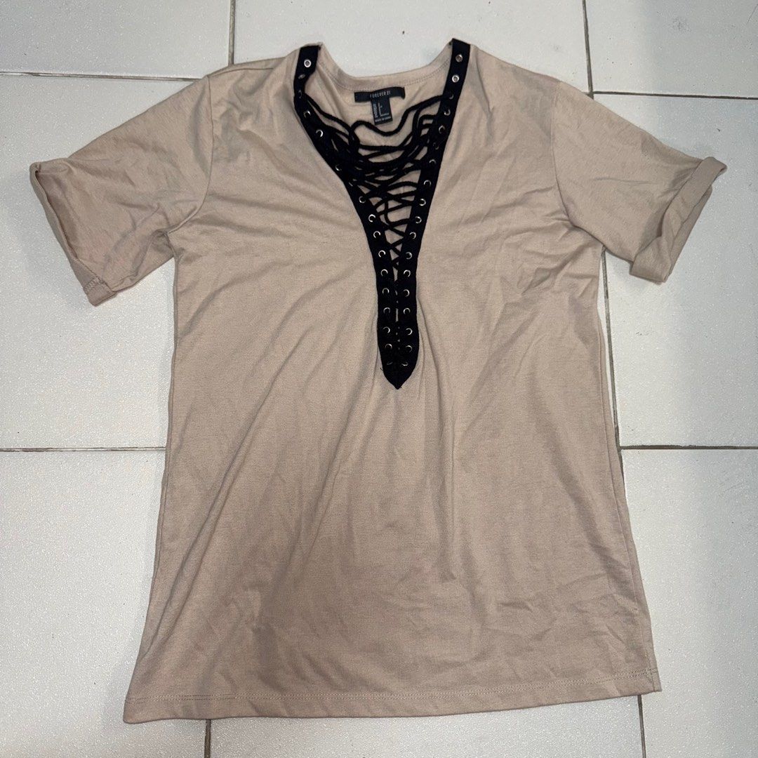 Forever 21 Oversize Tshirt Lace up MEDIUM- SEMI LARGE (Category: Others Tops) located in Manila. Submitted by eancc (Listing ID 1349111110, Image 1). Description: No damages, strings are intact, can fit medium to large frames ( US Small on tag but its oversized) RFS: Decluttering MOP: Gcash BDO BPI.