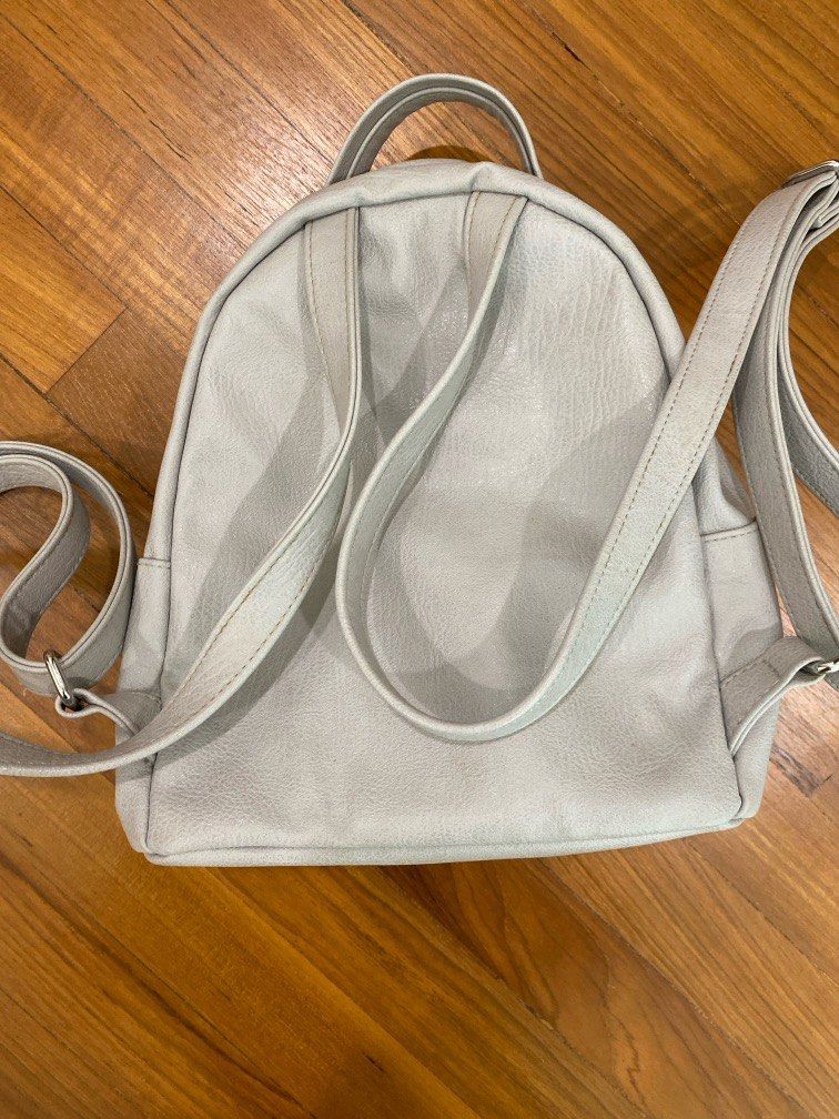 mini backpack (Category: Backpacks) located in Singapore. Submitted by jazzypeaches (Listing ID 1349032131, Image 2). Description: tiny backpack minor stains on the inside of the backpack.