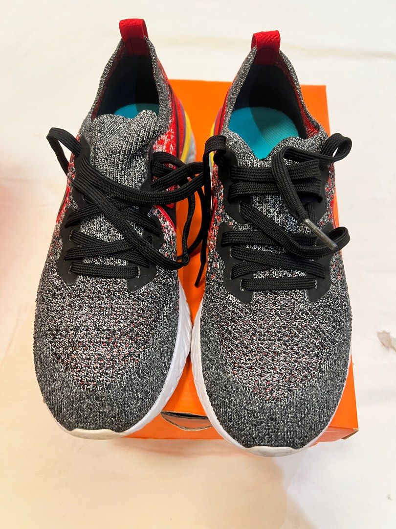 Nike Epic React Flyknit 2 (Category: Sneakers) located in Pasig City. Submitted by jassybeans (Listing ID 1349147725, Image 2). Description: Real. Barely worn. Only soles are dirty but the main shoe is 9/10 RFS: making more closet space. Shipping ℅ buyer.
