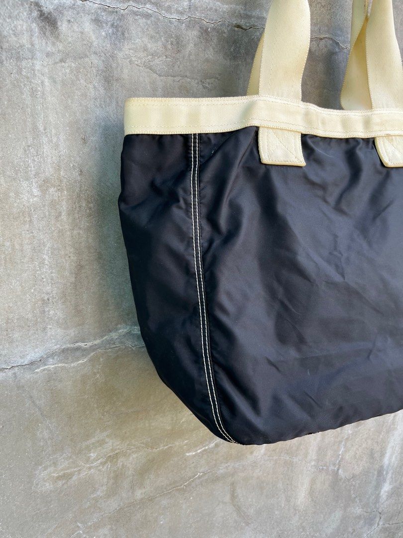 Porter Nylon Tote Bag (Category: Luxury Bags & Wallets) located in Baguio. Submitted by lordeidara (Listing ID 1349095249, Image 2). Description: 8/10 Signs of usage Needs light cleaning Color:Black Material:Polyester/Nylon Size on tag: Length:14.5 Width:6 Height:13 Strap Length:21 Number of Pockets:.