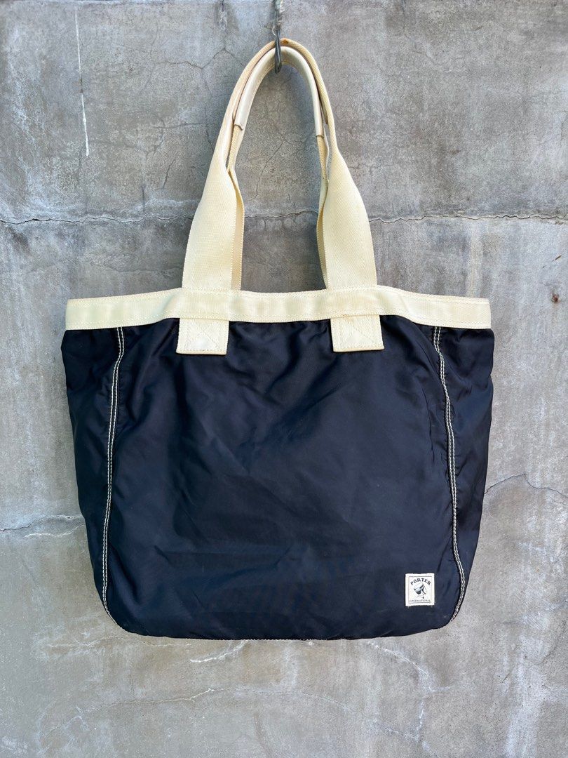 Porter Nylon Tote Bag (Category: Luxury Bags & Wallets) located in Baguio. Submitted by lordeidara (Listing ID 1349095249, Image 1). Description: 8/10 Signs of usage Needs light cleaning Color:Black Material:Polyester/Nylon Size on tag: Length:14.5 Width:6 Height:13 Strap Length:21 Number of Pockets:.