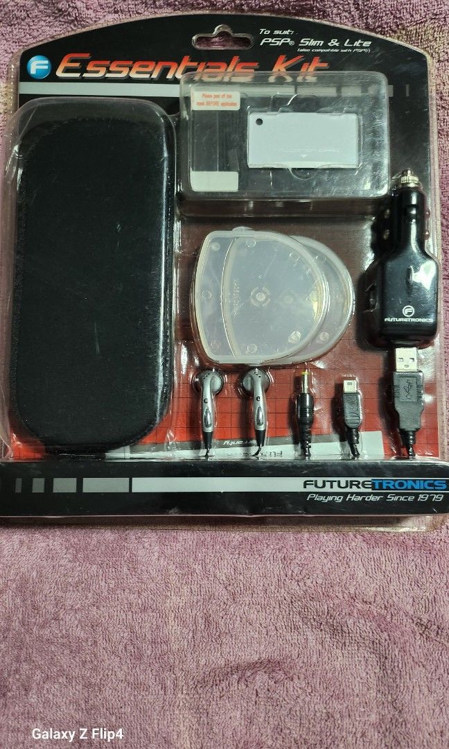 Psp essentials Kit (Category: Cables & Chargers) located in Singapore. Submitted by lcwxdxj (Listing ID 1349160421, Image 1). Description: 2 UMD game cases Cleaning Kit with Cloth Carry Pouch & Wrist Strap Stereo Earphones USB Link Cable Car Charger Note: Cash & Carry at 510446 Pasir Ris 7-11 Non Nego..