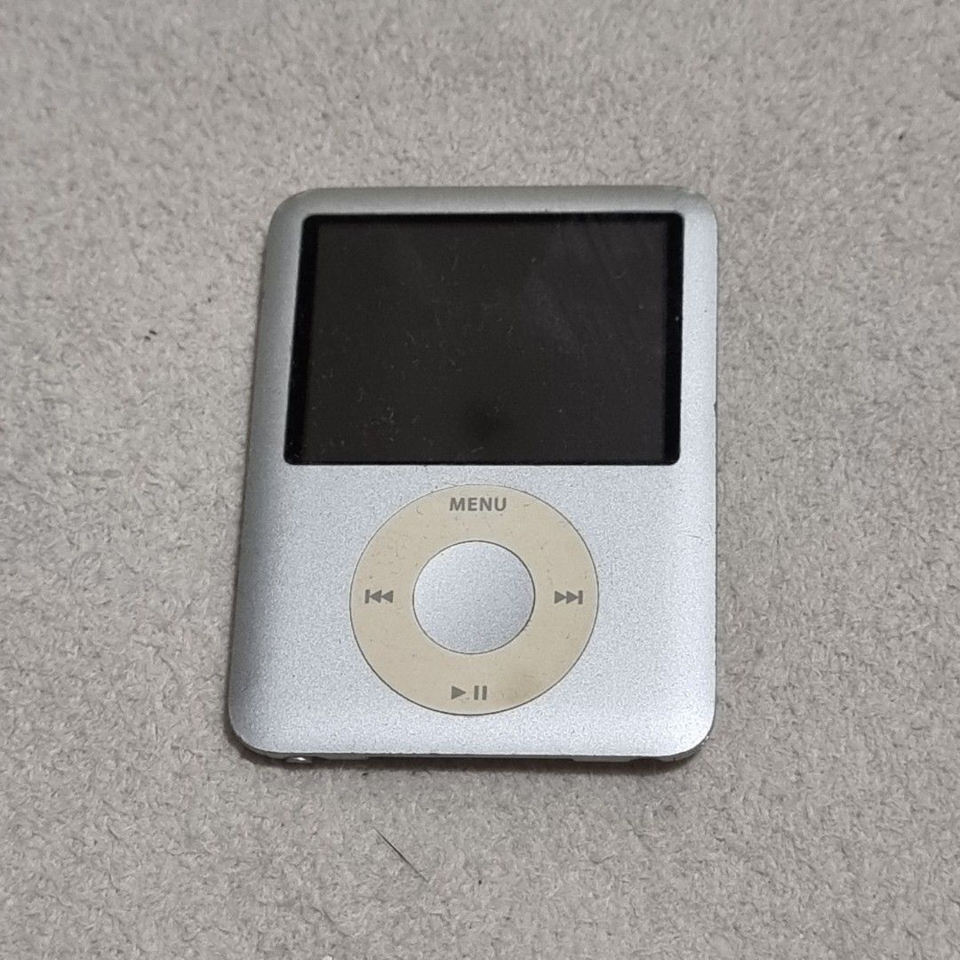 3rd Generation Silver iPod (Category: Portable Music Players) located in Pasig City. Submitted by lesmitch (Listing ID 1349146875, Image 1). Description: ▪︎ Defective (open's up but gets stuck from there - as seen in picture) - charging wire included ~ Check all photos for the item's actual condition and measurements ~ Payment is via gcash, pay maya or bdo ~ Shipping is via lalamove, grab, j&t or you can book your own preferred courier ~ There co