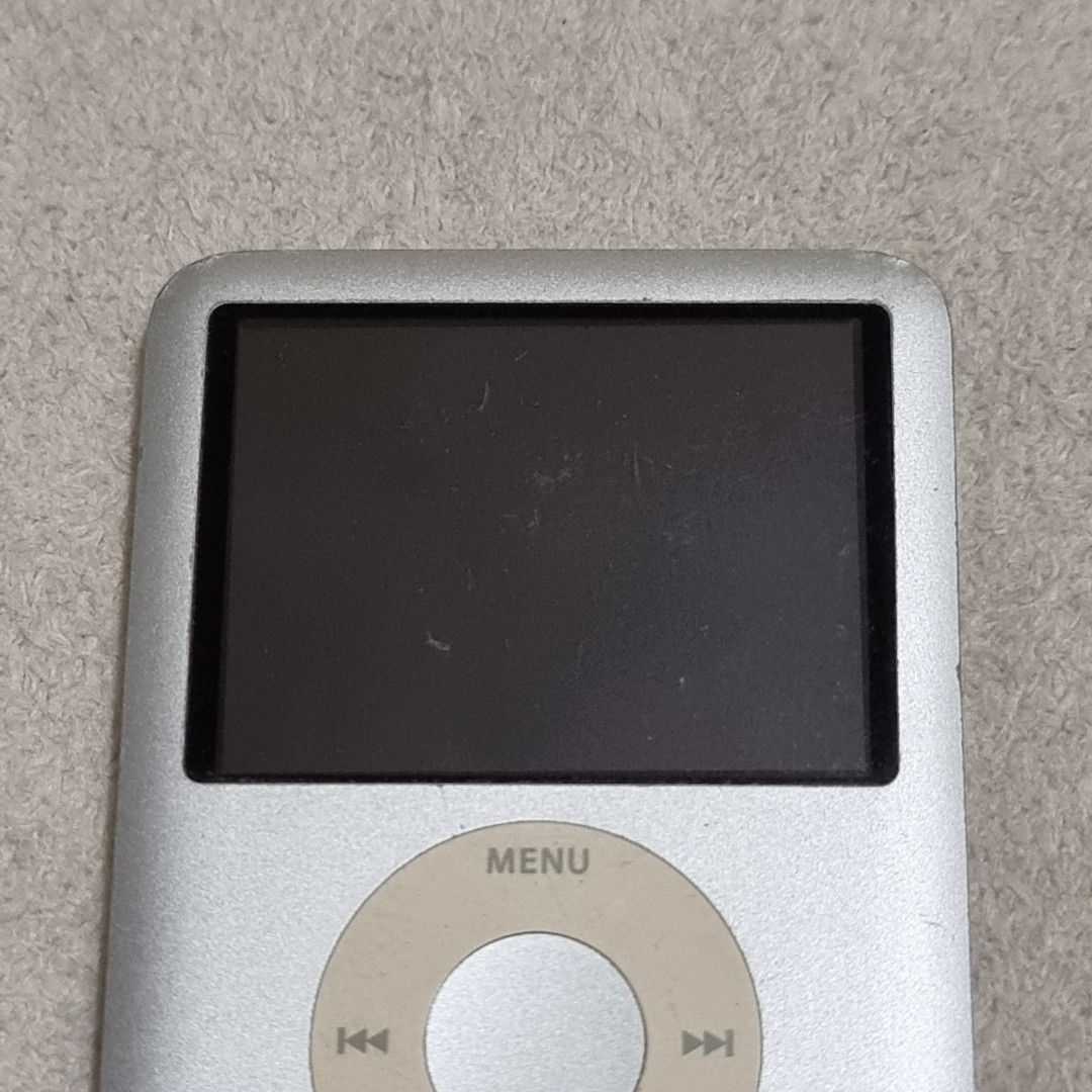 3rd Generation Silver iPod (Category: Portable Music Players) located in Pasig City. Submitted by lesmitch (Listing ID 1349146875, Image 2). Description: ▪︎ Defective (open's up but gets stuck from there - as seen in picture) - charging wire included ~ Check all photos for the item's actual condition and measurements ~ Payment is via gcash, pay maya or bdo ~ Shipping is via lalamove, grab, j&t or you can book your own preferred courier ~ There co