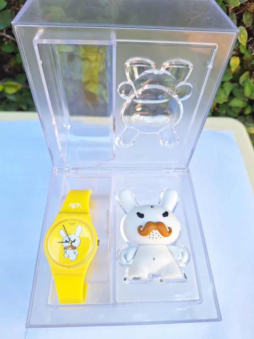 Swatch x kidrobot kozik 3” dunny with watch (Category: Women's Watches) located in Makati City. Submitted by hellokittytreasure (Listing ID 1349179679, Image 2). Description: Priority to buyer getting the full set of swatch x kidrobot.