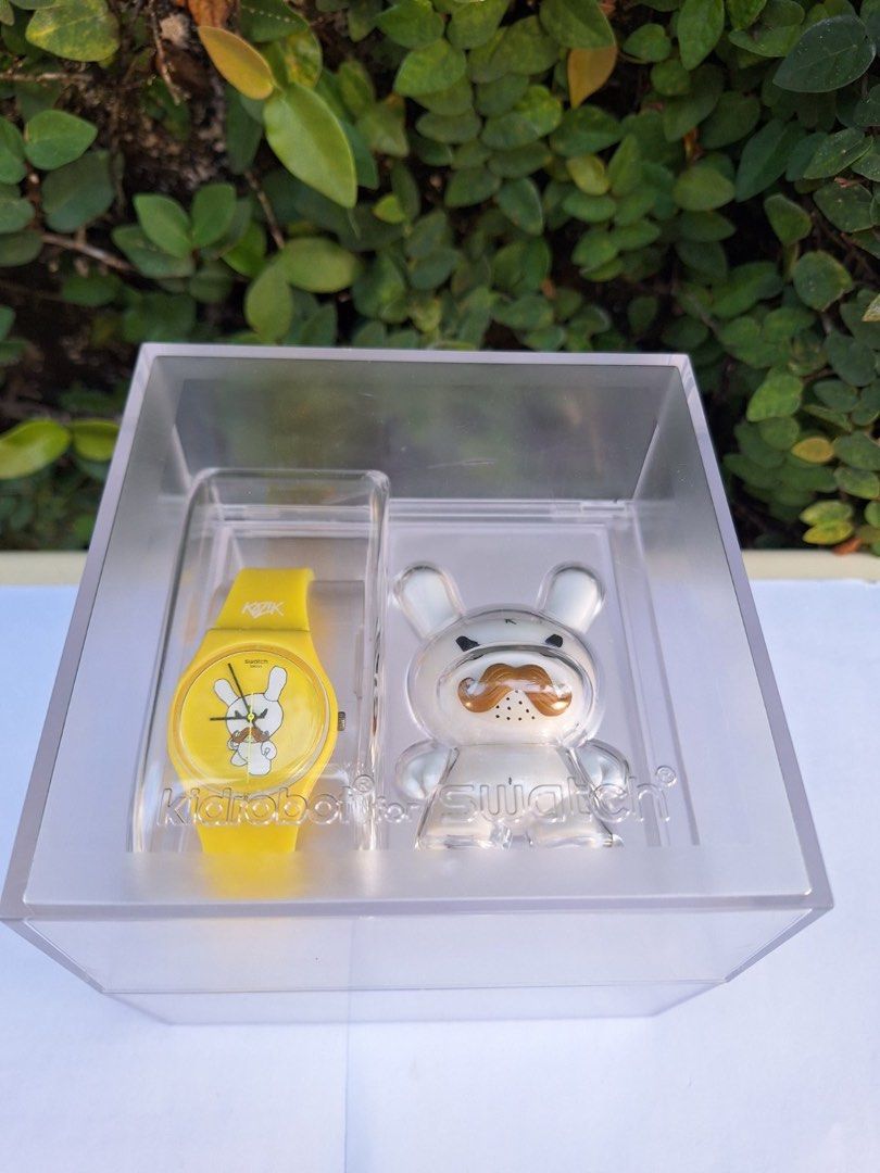 Swatch x kidrobot kozik 3” dunny with watch (Category: Women's Watches) located in Makati City. Submitted by hellokittytreasure (Listing ID 1349179679, Image 1). Description: Priority to buyer getting the full set of swatch x kidrobot.
