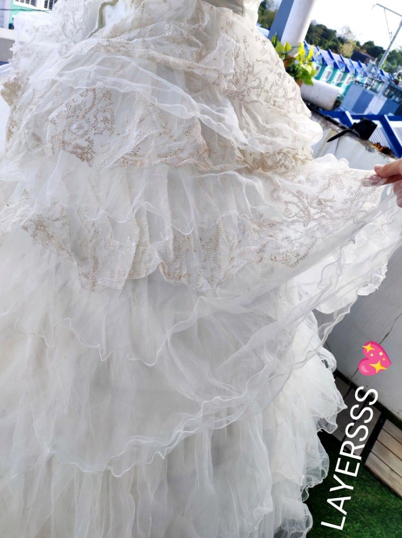 White Tube Layered ruffles gown (Category: Evening dresses & gowns) located in Rizal. Submitted by lexycolour (Listing ID 1349076027, Image 2). Description: ‼️Clearance Sale‼️ 💖S and M double Zipper 💖thin padded 💖tali and zipper both is good 💖 very clean ng tahi lalo na sa top mismo 💖 unnoticeable flaw pic #5 💖need wash (I didn't wash it) 💖image 7 no petticoat.