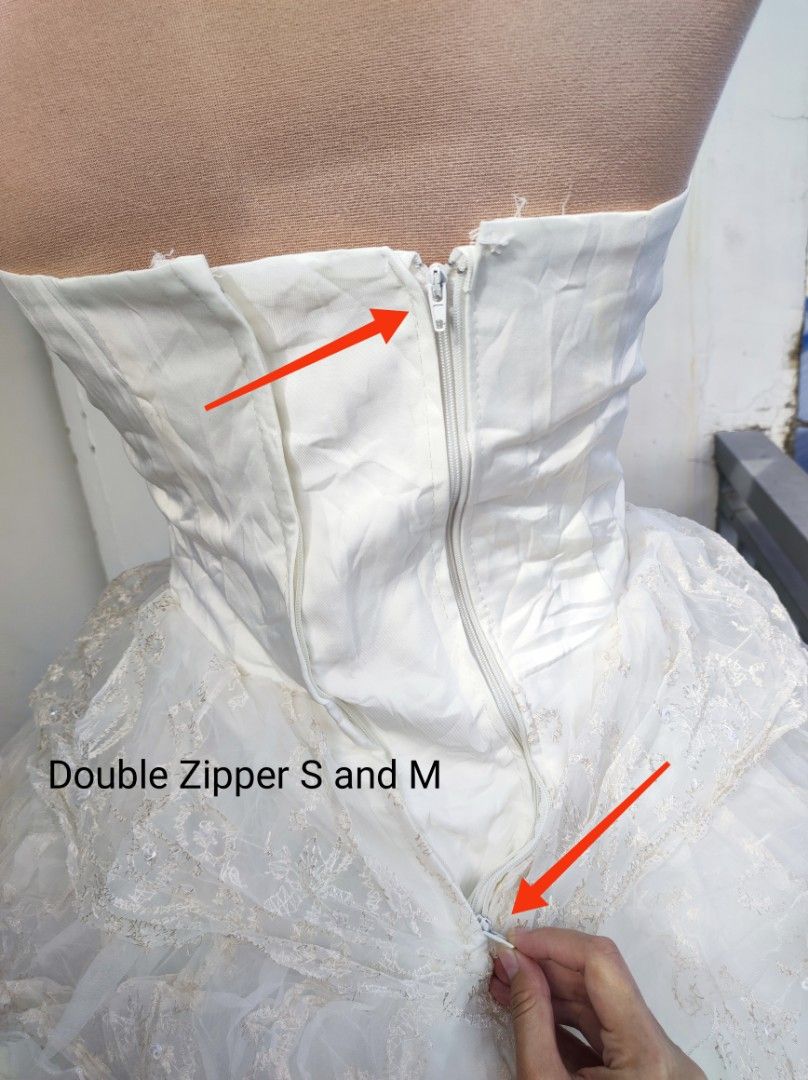 White Tube Layered ruffles gown (Category: Evening dresses & gowns) located in Rizal. Submitted by lexycolour (Listing ID 1349076027, Image 3). Description: ‼️Clearance Sale‼️ 💖S and M double Zipper 💖thin padded 💖tali and zipper both is good 💖 very clean ng tahi lalo na sa top mismo 💖 unnoticeable flaw pic #5 💖need wash (I didn't wash it) 💖image 7 no petticoat.