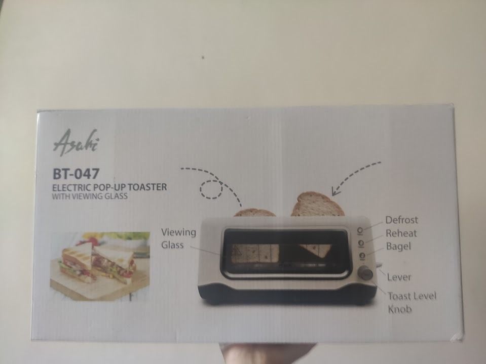Asahi Electric Pop-up Toaster White ( Model BT-047 ) (Category: Ovens & Toasters) located in Manila. Submitted by adette_ (Listing ID 1349274138, Image 1). Description: .