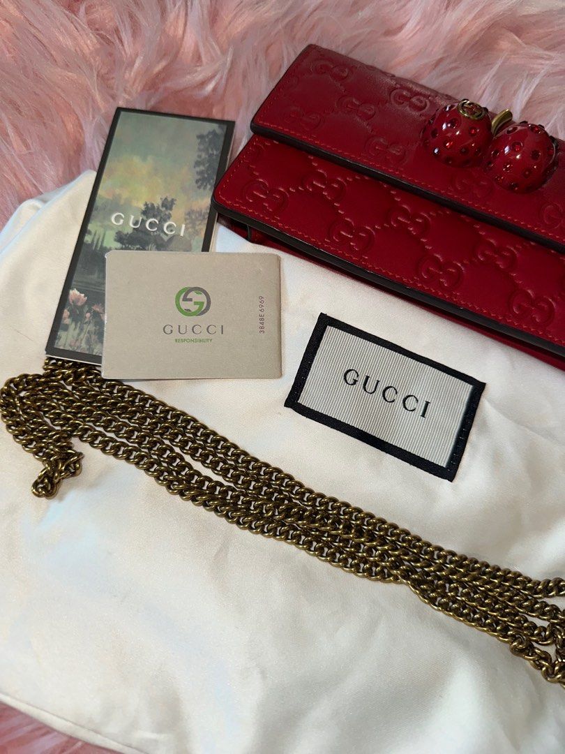 AUTHENTIC GUCCI LEATHER WALLET ON CHAIN (Category: Luxury Bags & Wallets) located in San Juan City. Submitted by declutterbykrispy (Listing ID 1349271384, Image 3). Description: Limited edition Authentic Guccissima cherry wallet on chain. In VERY GOOD CONDITION. Money back guarantee! Rfs: decluttering, no longer use need funds. .