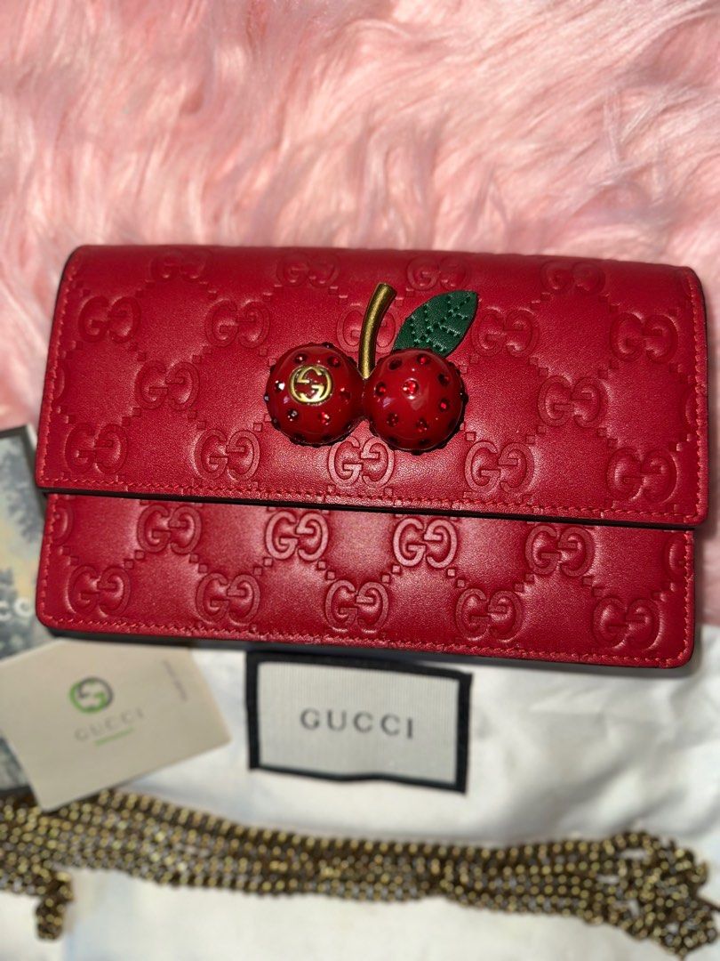 AUTHENTIC GUCCI LEATHER WALLET ON CHAIN (Category: Luxury Bags & Wallets) located in San Juan City. Submitted by declutterbykrispy (Listing ID 1349271384, Image 1). Description: Limited edition Authentic Guccissima cherry wallet on chain. In VERY GOOD CONDITION. Money back guarantee! Rfs: decluttering, no longer use need funds. .