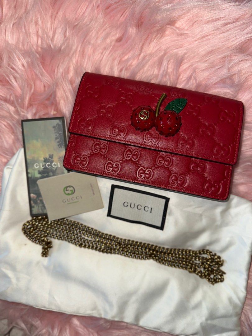 AUTHENTIC GUCCI LEATHER WALLET ON CHAIN (Category: Luxury Bags & Wallets) located in San Juan City. Submitted by declutterbykrispy (Listing ID 1349271384, Image 2). Description: Limited edition Authentic Guccissima cherry wallet on chain. In VERY GOOD CONDITION. Money back guarantee! Rfs: decluttering, no longer use need funds. .