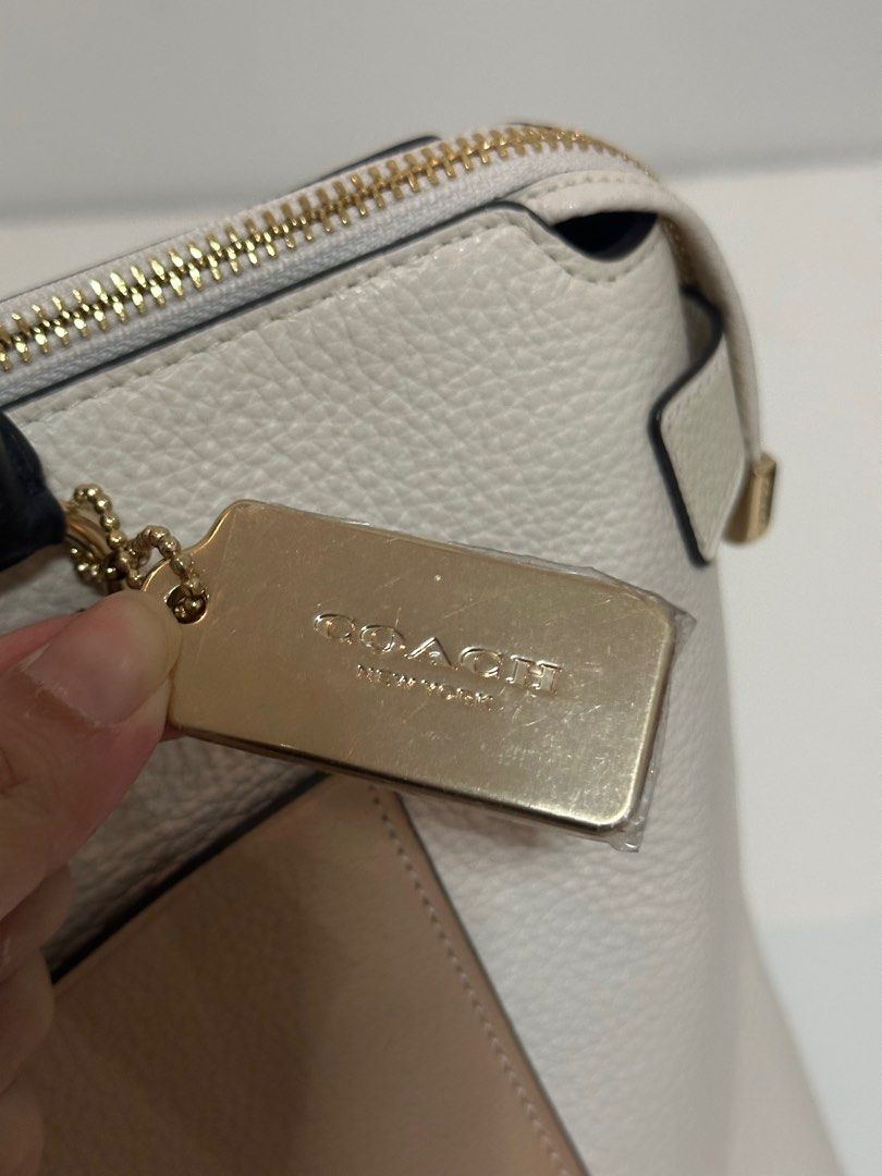 Coach Emma Satchel F73715 (Category: Luxury Bags & Wallets) located in Quezon City. Submitted by f.cleanup (Listing ID 1349270501, Image 3). Description: Coach Mini Emma Satchel F73715 - leather white beige - Never used, the tag inside has a scratch .