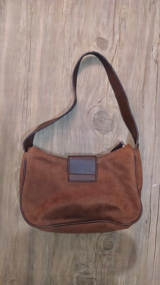 Faux Suede Shoulder Bag (Category: Shoulder Bags) located in Quezon City. Submitted by maychamatcha (Listing ID 1349278031, Image 2). Description: Preloved! My go-to shoulder bag vintage aesthetic Rfs: not using anymore/decluttering.