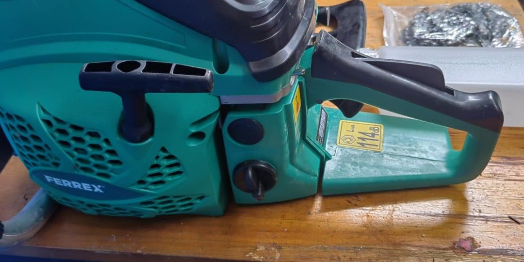 Ferrex Gasoline Mini Chainsaw (Category: Construction Tools & Equipment) located in Taytay. Submitted by mikz_1303 (Listing ID 1349214573, Image 3). Description: Ferrex Gasoline Mini Chainsaw 2 stroke 52cc 20' Anti vibration Brandnew (open box).