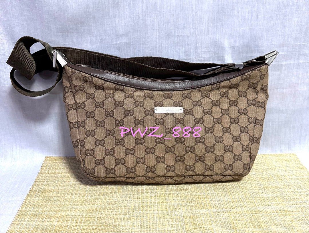 GUCCI Boat Bag Web Monogram Shoulder Bag (Category: Luxury Bags & Wallets) located in Baguio. Submitted by pwz-eshop (Listing ID 1349330404, Image 1). Description: • Please make reading a habit! • I do not reserve items. I only mark items as reserved when it is paid. Paid items are shipped the next day. No shipping on holidays. • Up for Grabs!! • Flaws: Minor dirt marks on corners. (please see photos) • Guaranteed Authentic! • BRAND: GUCCI. • DIM