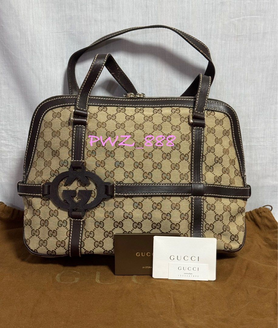 GUCCI Web Monogram Alma Shoulder Bag (Category: Luxury Bags & Wallets) located in Baguio. Submitted by pwz-eshop (Listing ID 1349329344, Image 1). Description: • Please make reading a habit! • I do not reserve items. I only mark items as reserved when it is paid. Paid items are shipped the next day. No shipping on holidays. • Up for Grabs!! • Flaws: Rubs on straps. Zippers needs lubrication. (please see photos) • Guaranteed Authentic! • BRAND: GU