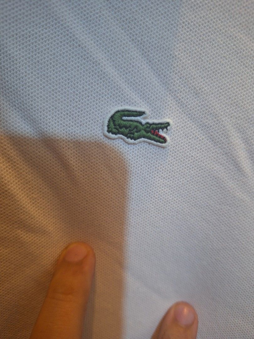 Lacoste polo shirt (Category: Tshirts & Polo Shirts ) located in Manila. Submitted by caster_tee (Listing ID 1349270784, Image 3). Description: original lacoste polo shirt W20/L28. no issue.