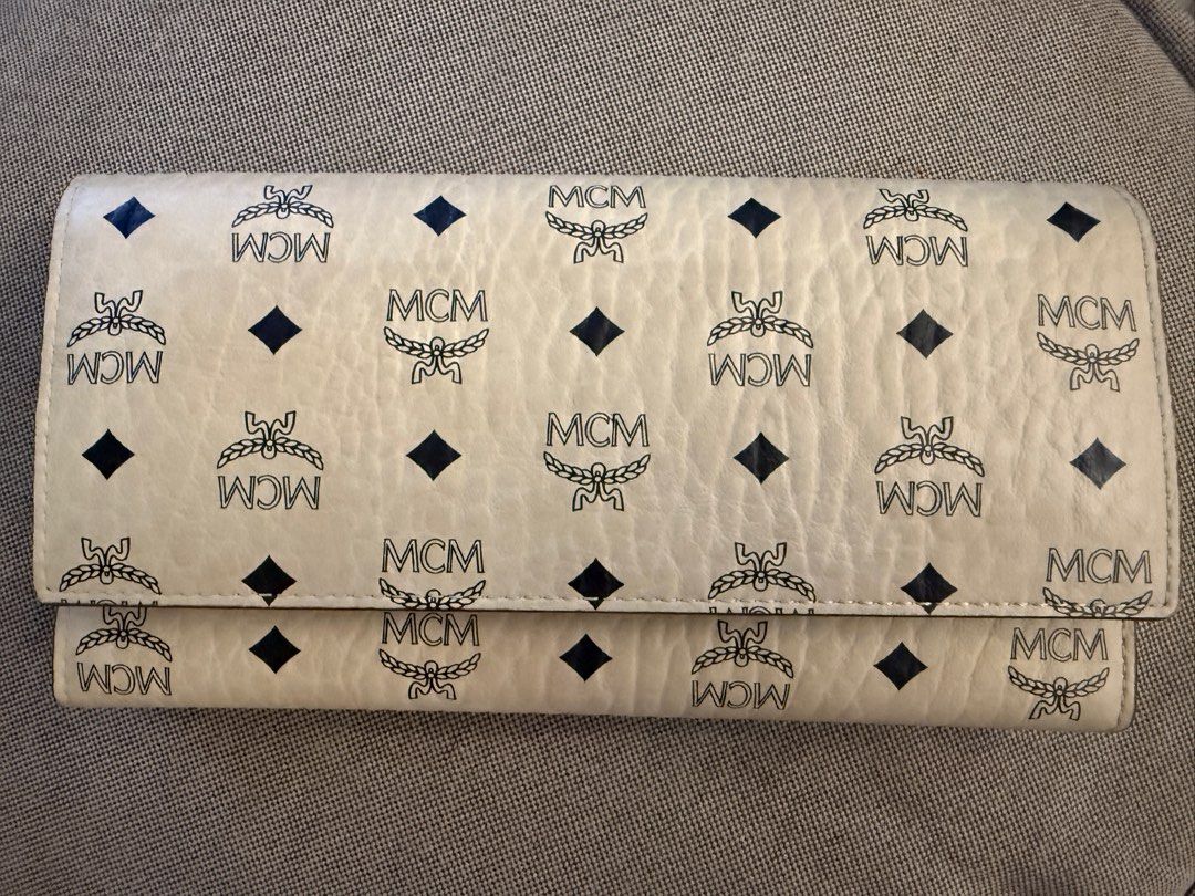 MCM Aren Continental Wallet in Visetos (Category: Bags & Wallets) located in Singapore. Submitted by ianndann (Listing ID 1349200657, Image 1). Description: Bought in April 2024. Authentic MCM Long wallet that was lightly used and still in pristine condition. Also comes with a box and dust bag. Retail brand new: $680, price listed is negotiable within reason. .