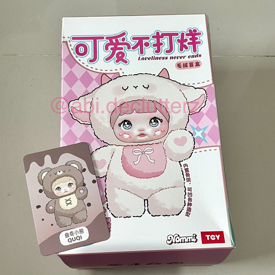 SEALED Nommi V1 Quqi (Category: Designer & Blind Box Toys) located in Taytay. Submitted by abi.declutterz (Listing ID 1349236056, Image 2). Description: SEALED Nommi V1 Quqi Box condition: see pictures + Comes with photocard & key ring Loc: Taytay, Rizal MOP: Gcash Shipping via lalamove Sf shouldered by the buyer pm me for more details 💌 video will be sent in tg/vib3r.