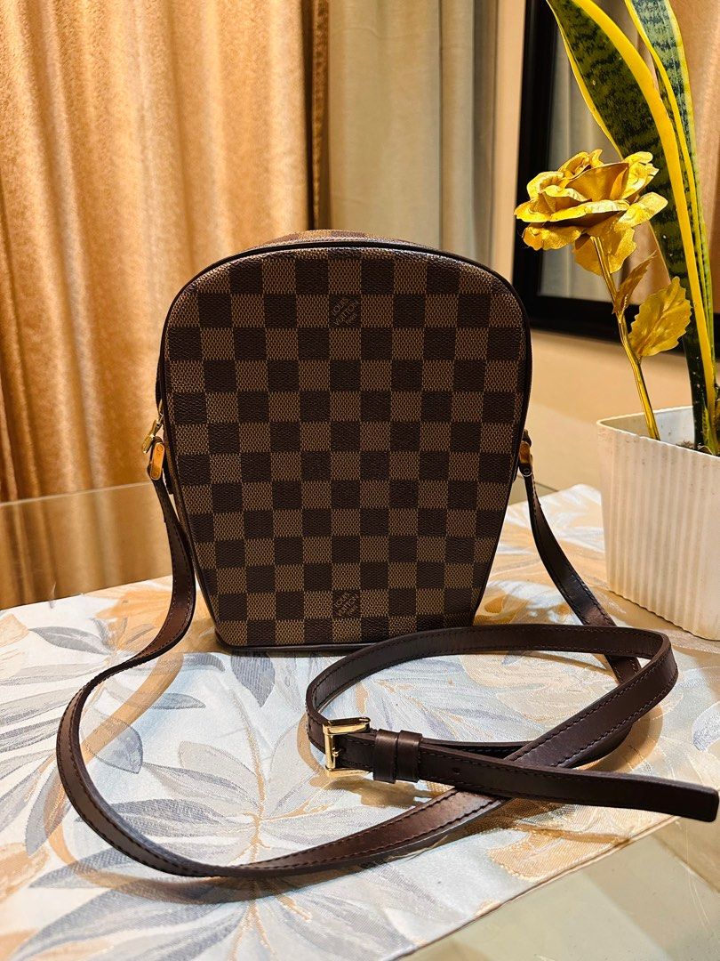 AUTHENTIC LV Damier body bag (Category: Luxury Bags & Wallets) located in Quezon City. Submitted by FashionFab (Listing ID 1349383038, Image 3). Description: 100% original in a very good condition. Rare pieces from LV Japan store. No damages. No foul smell. Original dust bag included..