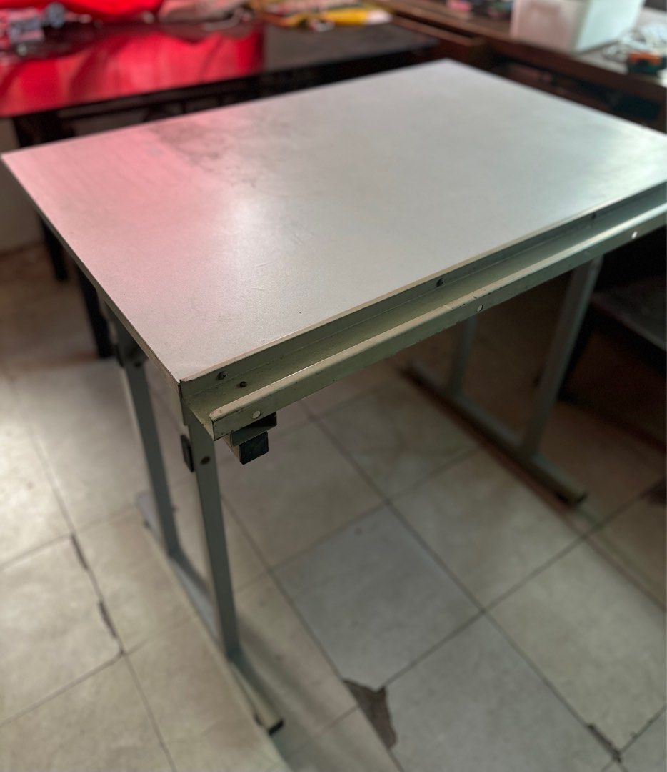 Drafting table ( metal ) for architectural courses (Category: Tables & Sets) located in Manila. Submitted by margajeru (Listing ID 1349227538, Image 3). Description: For sale : Drafting table metal type sya ( I can send video ) if you are interested issue : just need re paint if you want it to be look like brand new lng is 2ft lenght and 3ft width of the table location : Rizal area you can book via lalamove mejj mabigat ang table so I suggest nak