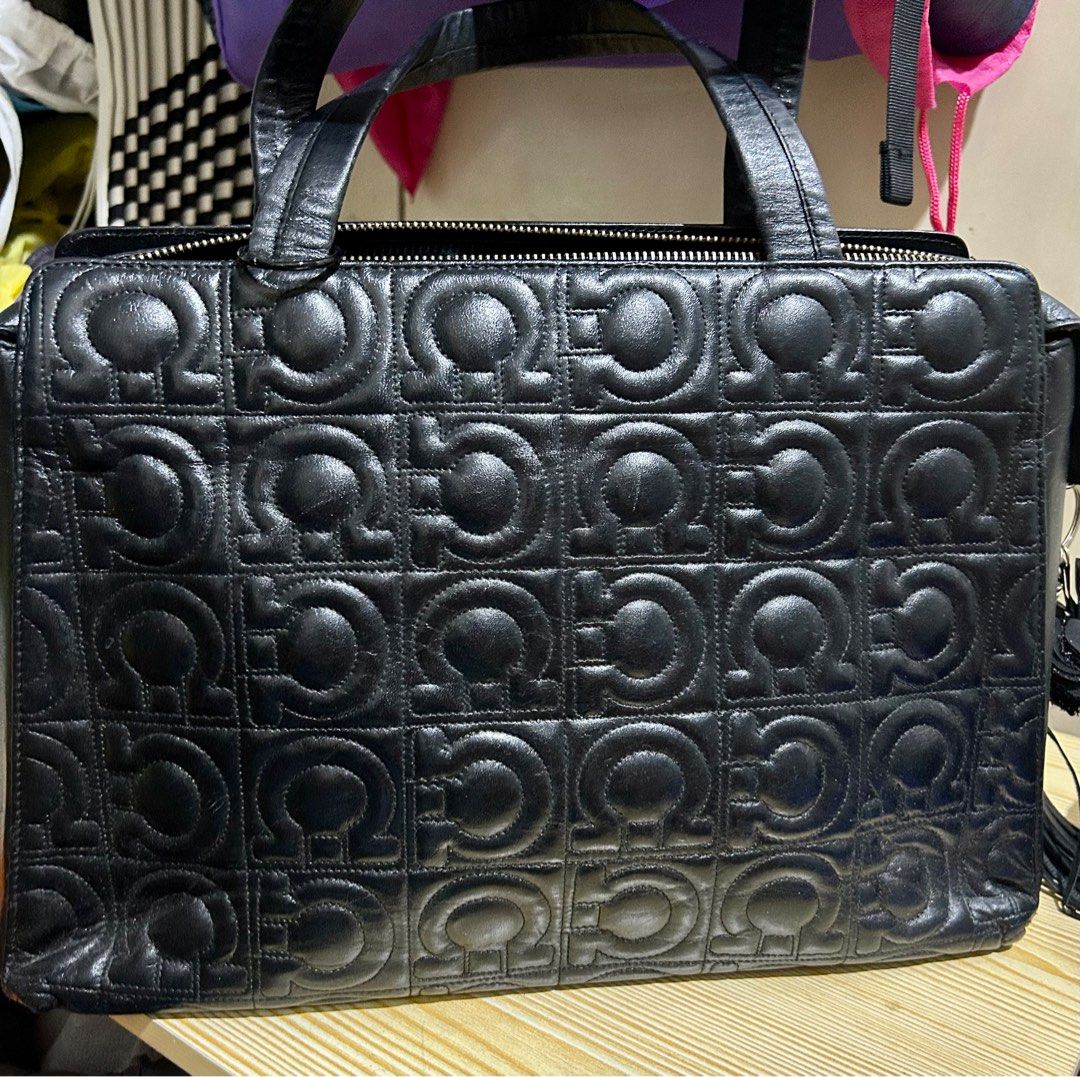Ferragamo laptop/handbag (Category: Luxury Bags & Wallets) located in Quezon City. Submitted by asiaco (Listing ID 1349469339, Image 1). Description: Nagsusumigaw na ferragamo. Can be used as a laptop bag or just plain handbag. Replaced puller. .