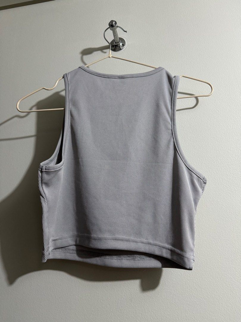 Gray Sleeveless Tank Top (Category: Shirts) located in Makati City. Submitted by danandy12 (Listing ID 1349539253, Image 2). Description: Gray sleeveless top! Has a slight unnoticeable flaw (last pic) ✨ Size: S RFS: Decluttering.