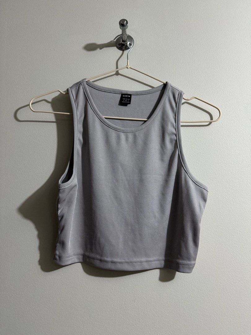 Gray Sleeveless Tank Top (Category: Shirts) located in Makati City. Submitted by danandy12 (Listing ID 1349539253, Image 1). Description: Gray sleeveless top! Has a slight unnoticeable flaw (last pic) ✨ Size: S RFS: Decluttering.