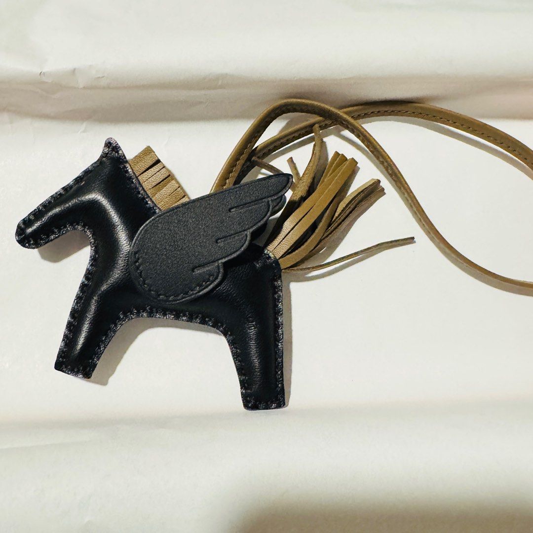 Hermes Pegase PM Bag Charm Noir/Etoupe/Noir (Category: Accessories) located in Singapore. Submitted by missbrownbear (Listing ID 1349521590, Image 1). Description: Color: Noir/Etoupe/Noir Full set with photocopy receipt Stamp W.