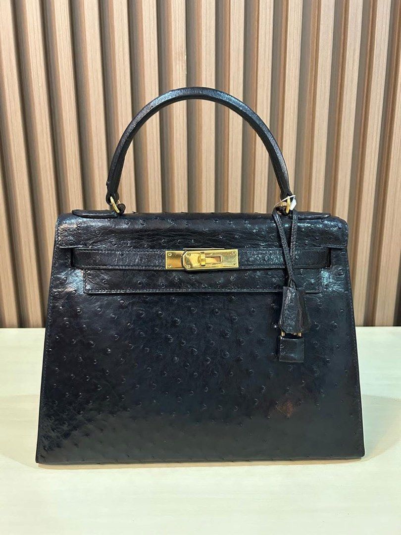 Hermes Vintage Kelly 28 (Category: Luxury Bags & Wallets) located in Manila. Submitted by bagislifeshop (Listing ID 1349413148, Image 2). Description: W▪️H E R M E S Vintage Kelly 28▪️ ☑️Available in Pampanga ✅Open for layaway ✅Condition: 8.5/10 ✅Material: Ostrich sellier ✅Colour: Black ✅Inclusion: long strap, lockset and photocopied receipt .