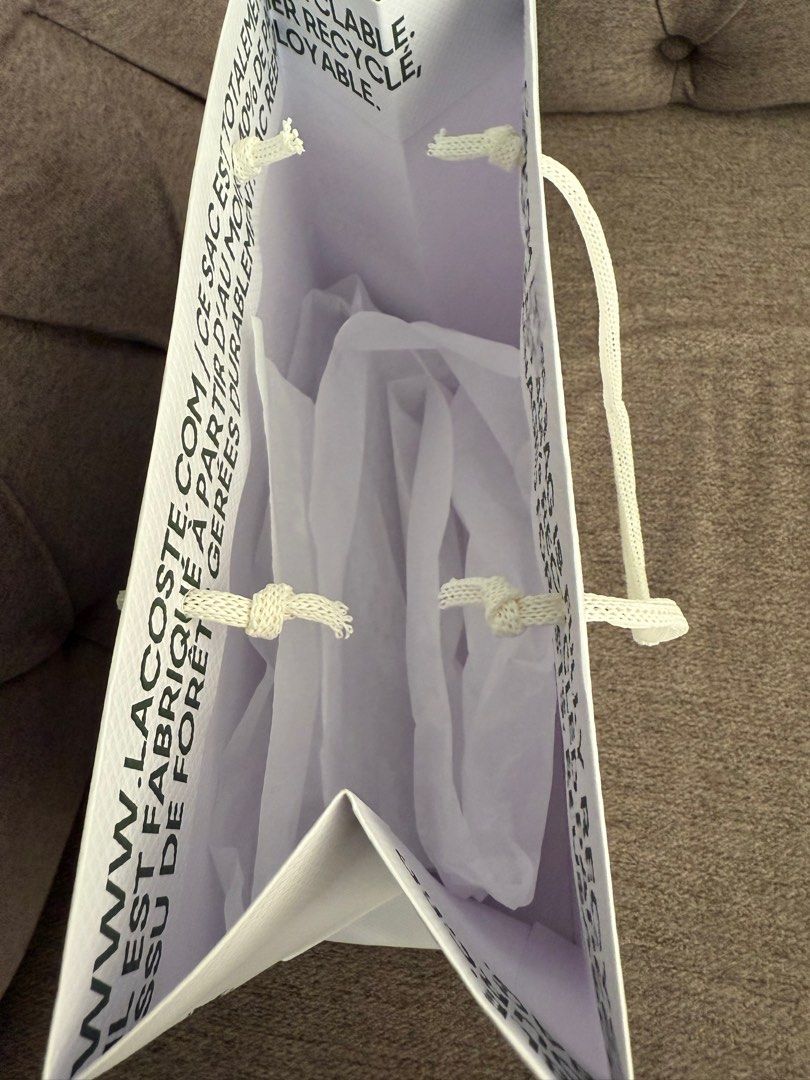 Lacoste Paper Bag (New and Fresh) (Category: Luxury Accessories) located in Manila. Submitted by sweetlips01 (Listing ID 1349396956, Image 2). Description: .