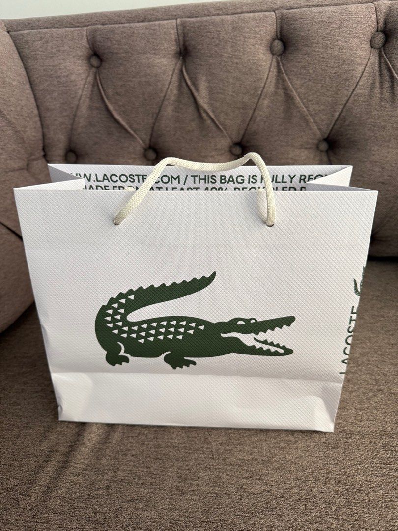 Lacoste Paper Bag (New and Fresh) (Category: Luxury Accessories) located in Manila. Submitted by sweetlips01 (Listing ID 1349396956, Image 1). Description: .