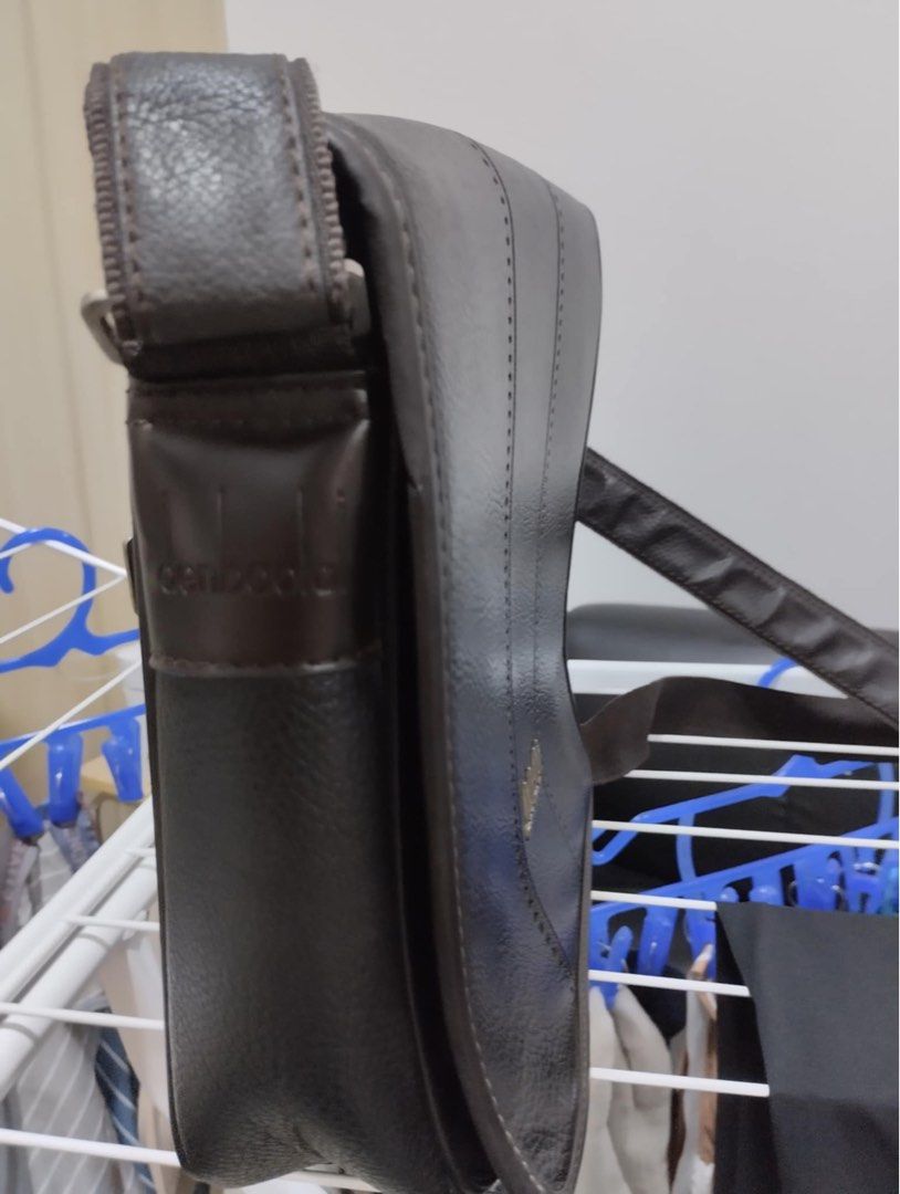 Leather Bag (unisex) (Category: Sling Bags) located in Paranaque City. Submitted by d_clutterss (Listing ID 1349437215, Image 2). Description: - never used - bought for almost 1k - rfs decluttering.