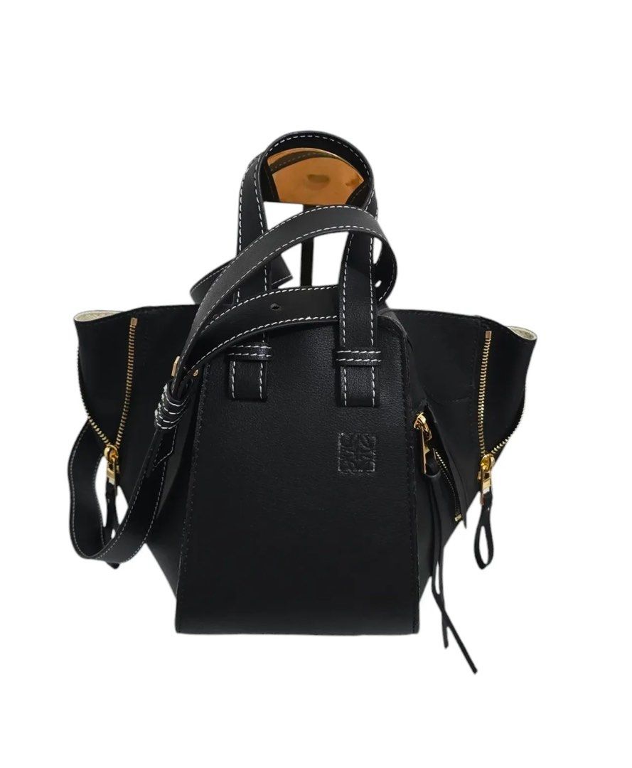 Loewe Bag (Category: Luxury Bags & Wallets) located in Binan City. Submitted by mcsolis (Listing ID 1349465468, Image 1). Description: Compact size 7”L x 7.5”H x 4.1”D Hand / sling bag adjustable In very good condition dition With dust bag and care cards From 🇯🇵 surplus/ukay. NGA What you see is what you get.