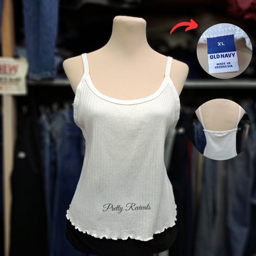 OLd Navy XL white sando tank top / Spaghetti strap (Category: Sleeveless) located in Quezon City. Submitted by prettyrevivalsph (Listing ID 1349411506, Image 1). Description: XL on tag from USA size may run bigger.