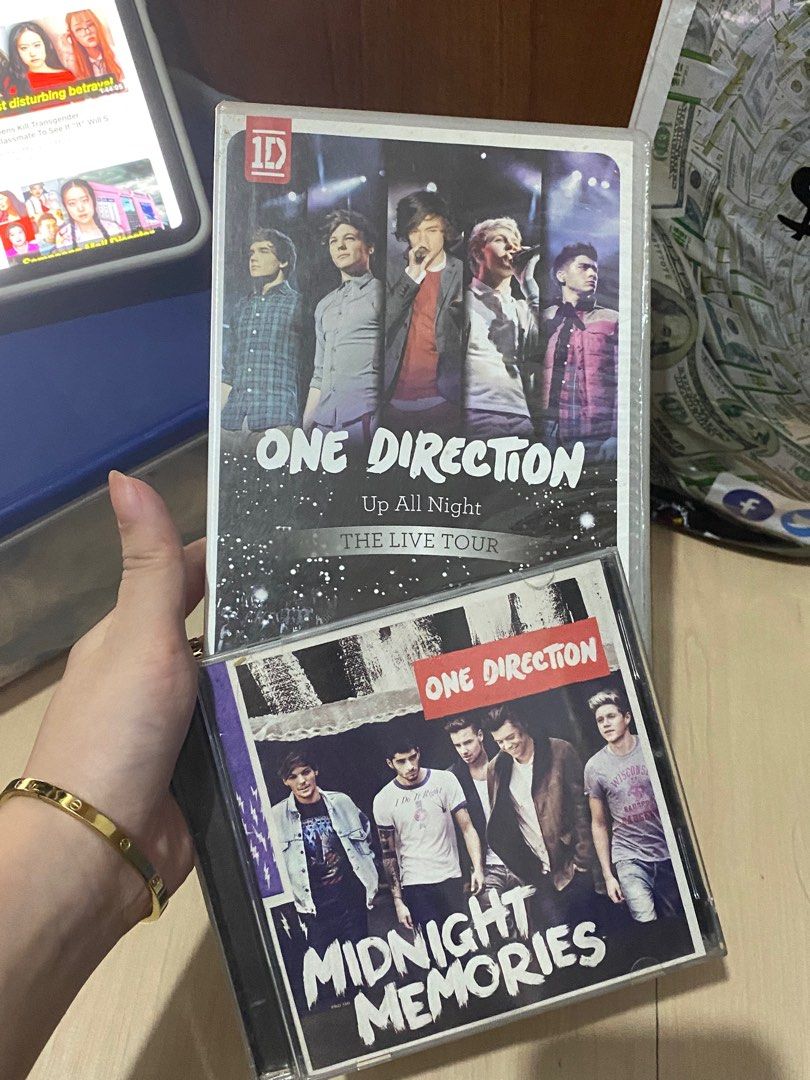 One Direction Albums (Category: CDs & DVDs) located in Navotas City. Submitted by jaldeclutters (Listing ID 1349466231, Image 1). Description: both for 500..