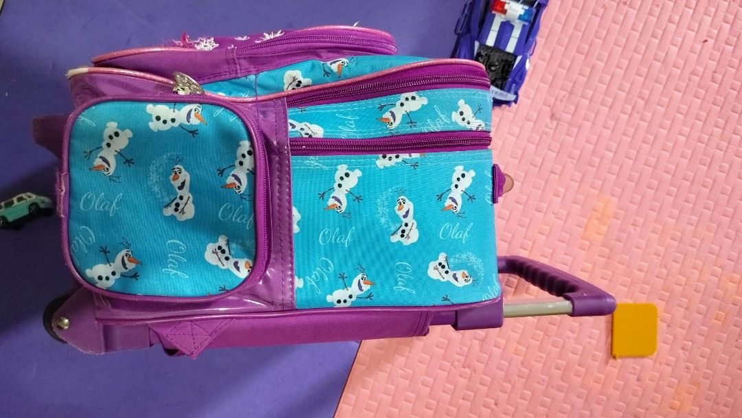 Trolley bag kids (Category: Babies & Kids Fashion) located in Estancia. Submitted by mapzie (Listing ID 1349457093, Image 3). Description: location: ESTANCIA,ILOILO trolley bag kids ORIGINAL flaws: nakagat ng daga gilid bulsa OVERALL CONDITION IS VERY GOOD! sobrang magagamit pa hindi halata CLEANED AND WASHED ang butas original bought in SM for 2k plus SERIOUS BUYERS ONLY gcash,maya J&T estimated 180php sf due to size and weight.