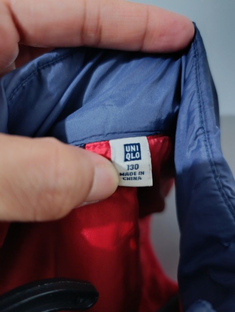 Uniqlo Puffer Vest (Category: Babies & Kids Fashion) located in Manila. Submitted by yunicool (Listing ID 1349364649, Image 2). Description: Uniqlo Kids Puffer Vest (4–5Y), lightweight and warm with a pink and navy design. Gently used, in excellent condition. Perfect for layering in cooler weather!.