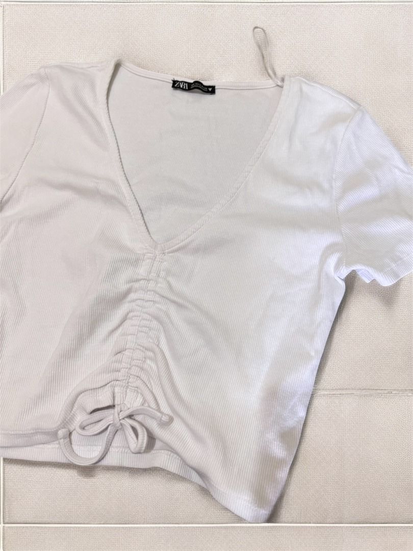 Zara White Ruched Ribbed Shirt (Category: Blouses) located in Puerto Princesa. Submitted by maria_kondoing (Listing ID 1349439279, Image 1). Description: Zara Ruched Ribbed Shirt Tag is L but fits M-L kasi super stretch bought at 795 .