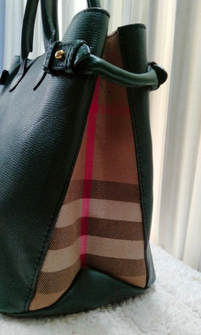 Authentic Burberry Banner 2 way (Category: Luxury Bags & Wallets) located in Dasmarinas. Submitted by derliederr63522 (Listing ID 1349572684, Image 3). Description: ●Excellent condition●BURBERRY BANNER●Nova check●Canvas calf leather genuine leather●2way hand bag●Dark green●G metal fittings●A4●Js53089 This is a very luxurious Burberry handbag made of high-quality calf leather. There are some scuffs and small scratches, but otherwise there is no ma