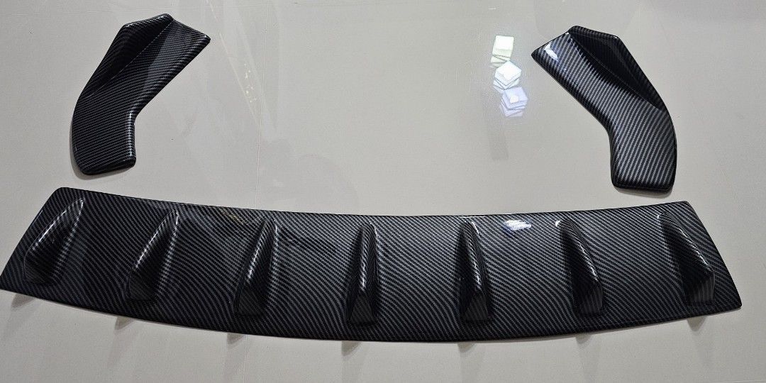 Carbon Printed Diffusers (Category: Bodykits & Styling) located in Singapore. Submitted by RichardT56 (Listing ID 1349719962, Image 1). Description: Price revised down as of 14th December 2025. Selling Carbon Printed Rear and Bumper Diffusers. Selling "As-Is", No Warranty, No Exchange and No Return..