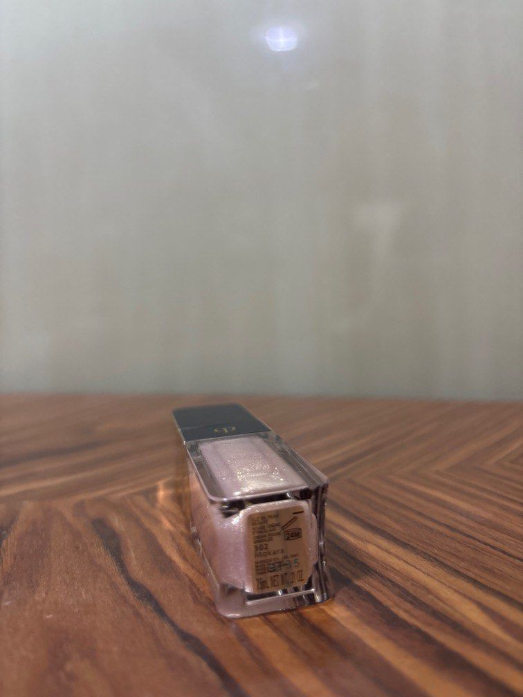 Cle de Peau Lip Glass (Category: Makeup) located in Makati City. Submitted by thriftshopmkti (Listing ID 1349681078, Image 2). Description: Shade : 302 Mokara CDP Rouge Sparkles.