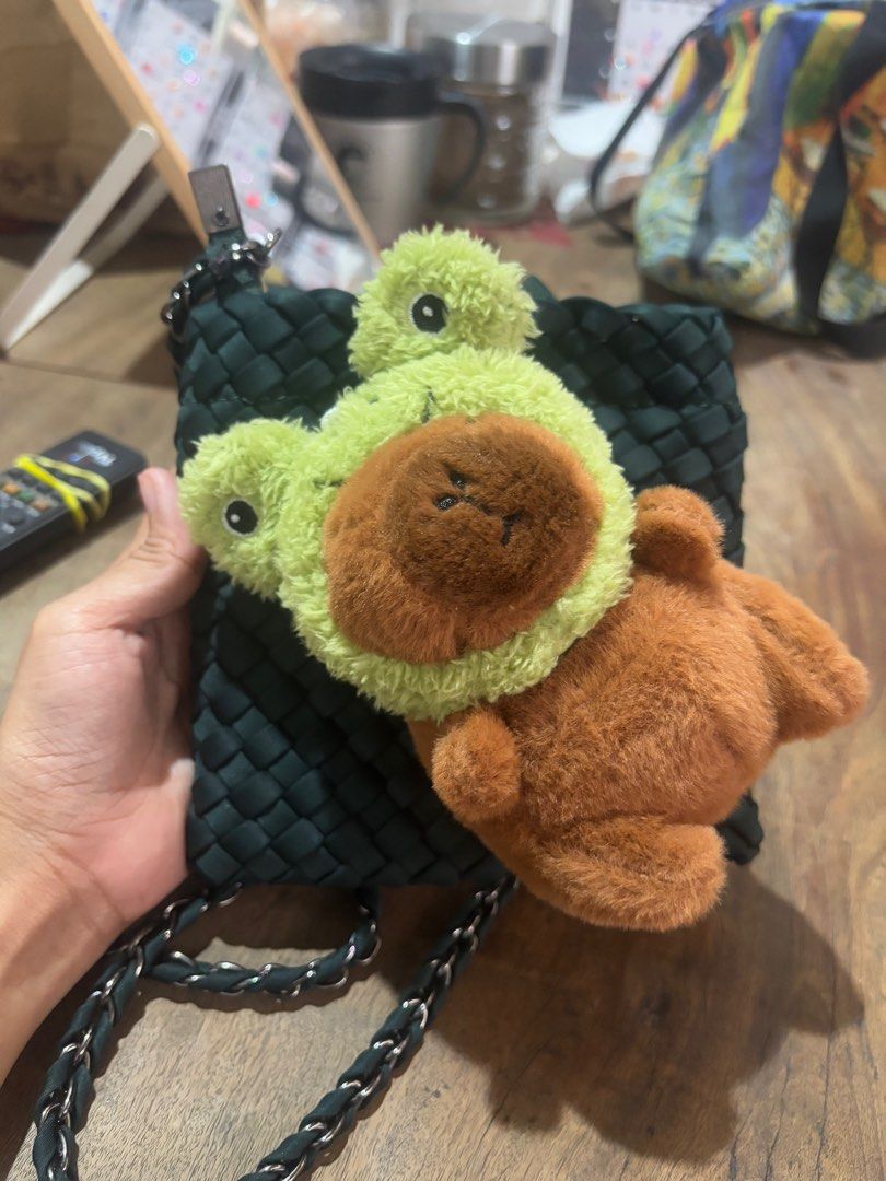 CMG bag (Category: Shoulder Bags) located in Makati City. Submitted by mkgrcb (Listing ID 1349641560, Image 2). Description: Original price: 2000 2 bags - 1 small shoulder bag, 1 handbag Handbag can also use the strap of small bag. Dolls attached on the bag using a pin. Can be removed. Small bag na may capybara, nakatahi but I think it can easily be removed too..
