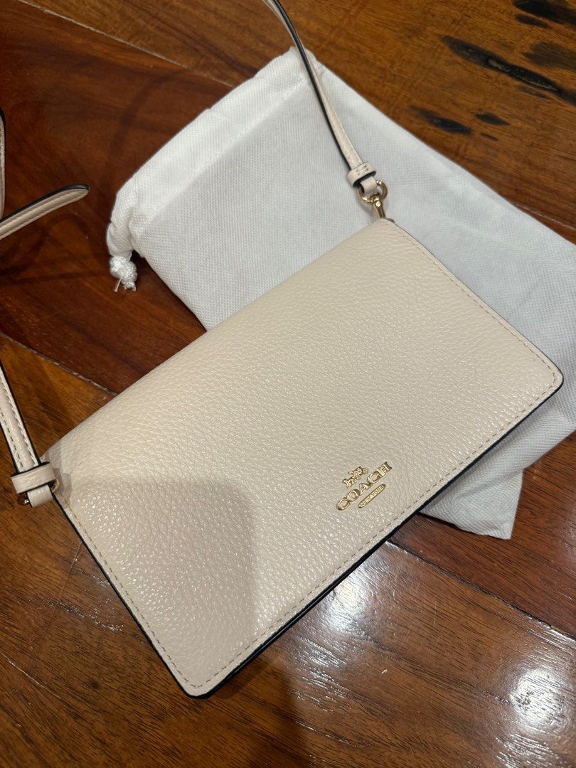 Coach Anna Foldable Cluth Crossbody (Category: Luxury Bags & Wallets) located in Quezon City. Submitted by mikeepreloveditems (Listing ID 1349730516, Image 3). Description: Brand new. Never used. Inclusions: Paper bag and Dust Bag.