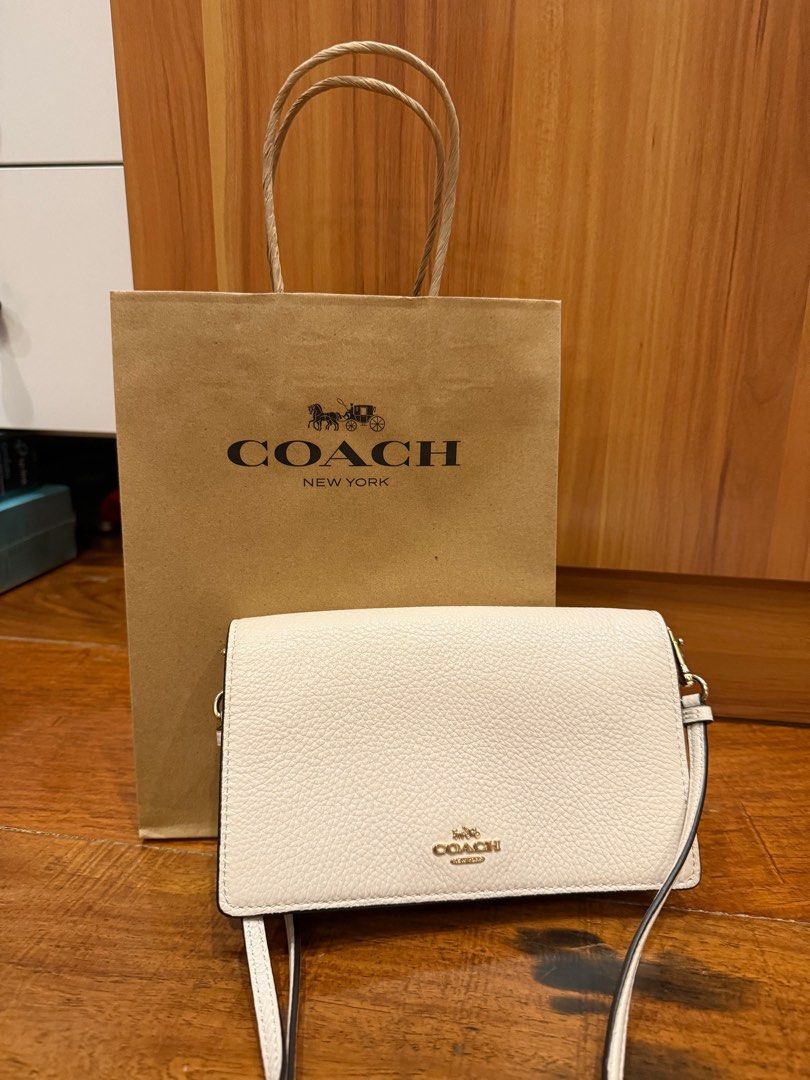 Coach Anna Foldable Cluth Crossbody (Category: Luxury Bags & Wallets) located in Quezon City. Submitted by mikeepreloveditems (Listing ID 1349730516, Image 1). Description: Brand new. Never used. Inclusions: Paper bag and Dust Bag.