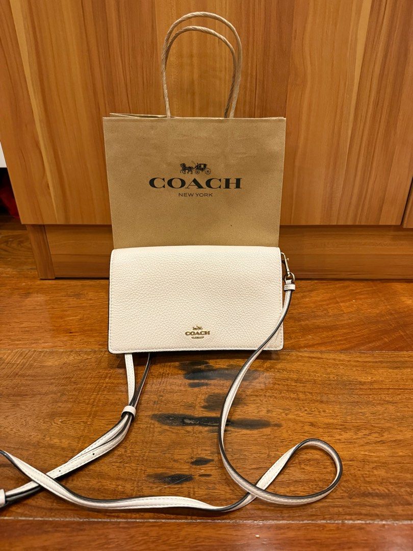 Coach Anna Foldable Cluth Crossbody (Category: Luxury Bags & Wallets) located in Quezon City. Submitted by mikeepreloveditems (Listing ID 1349730516, Image 2). Description: Brand new. Never used. Inclusions: Paper bag and Dust Bag.